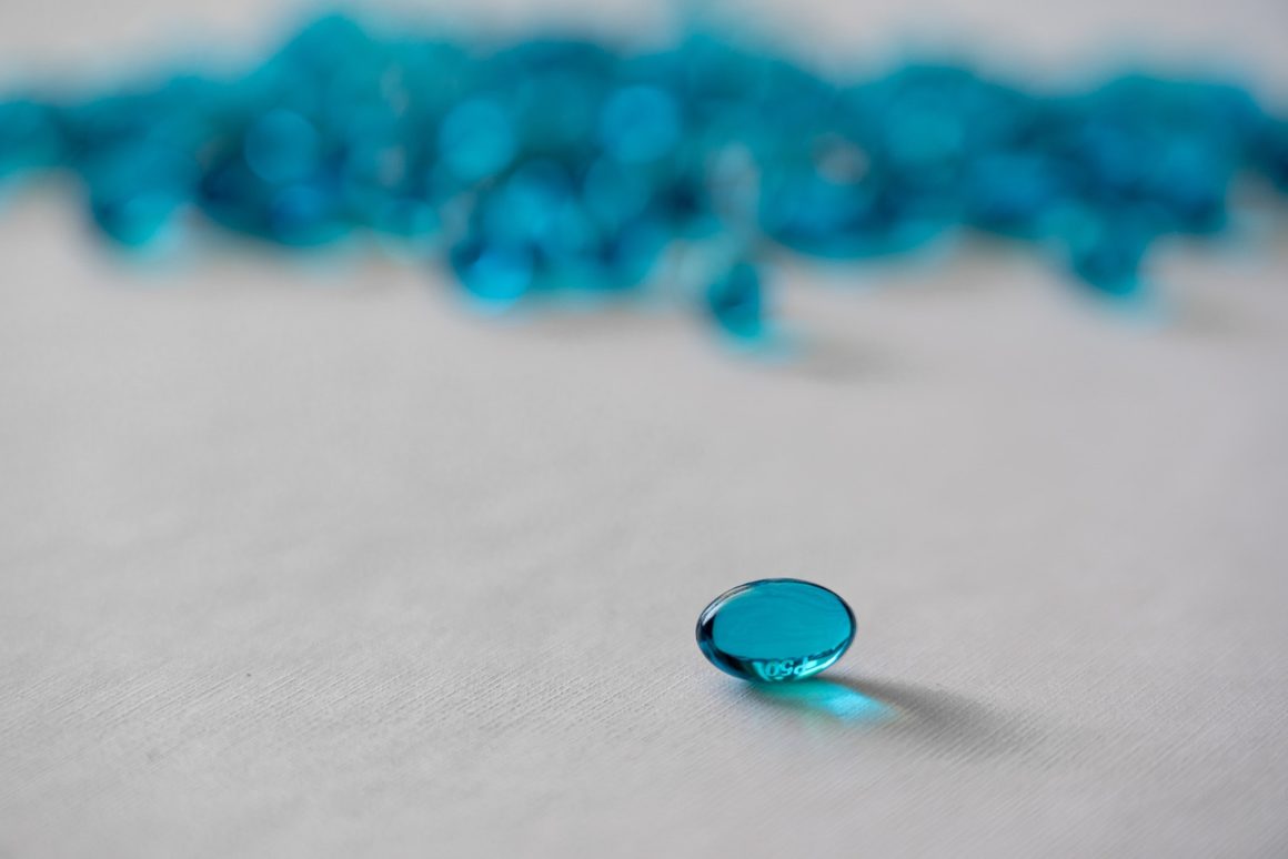 Blue Gel Capsule On Table